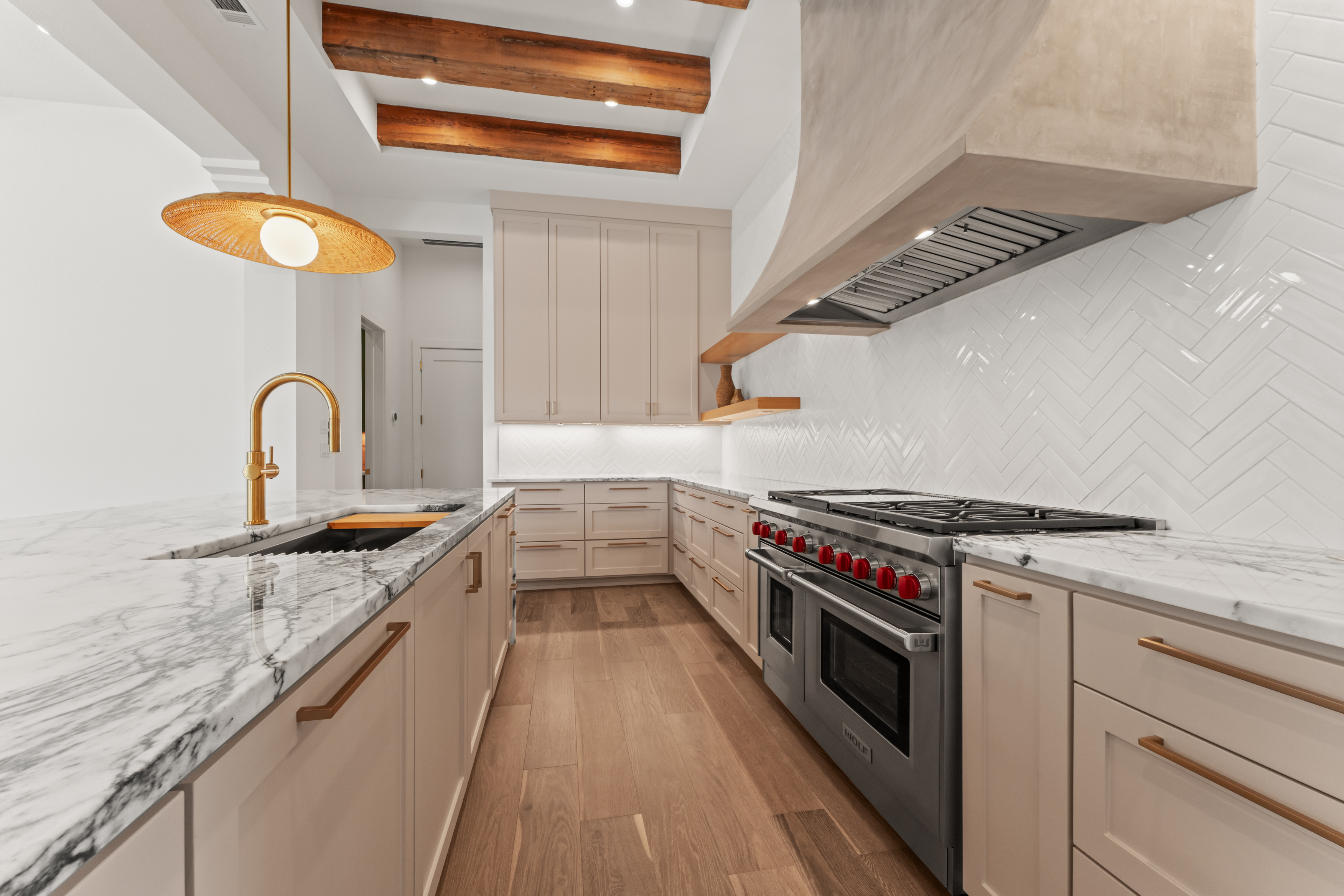 Custom home kitchen with finishes and systems requiring coordinated care